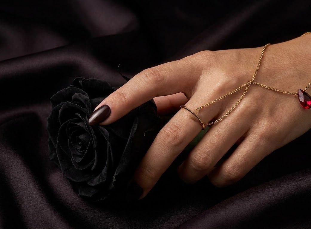 Queen’s Grasp fine gold hand chain with a garnet drop, concept render